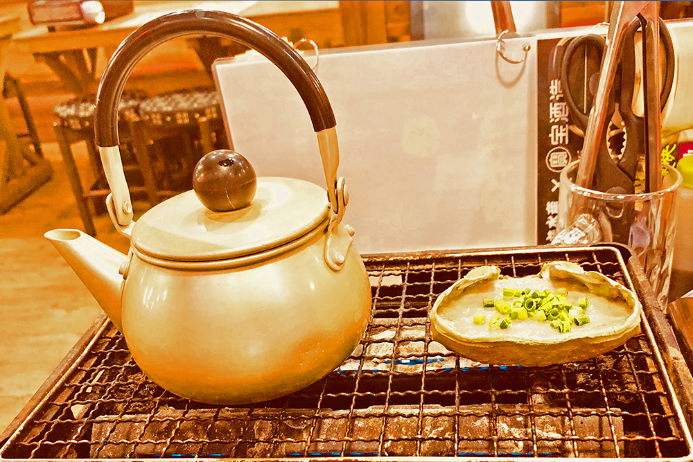 磯丸水産吉祥寺北口店の一番人気の蟹味噌甲羅焼